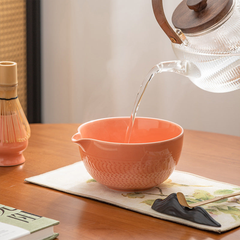Whisking matcha